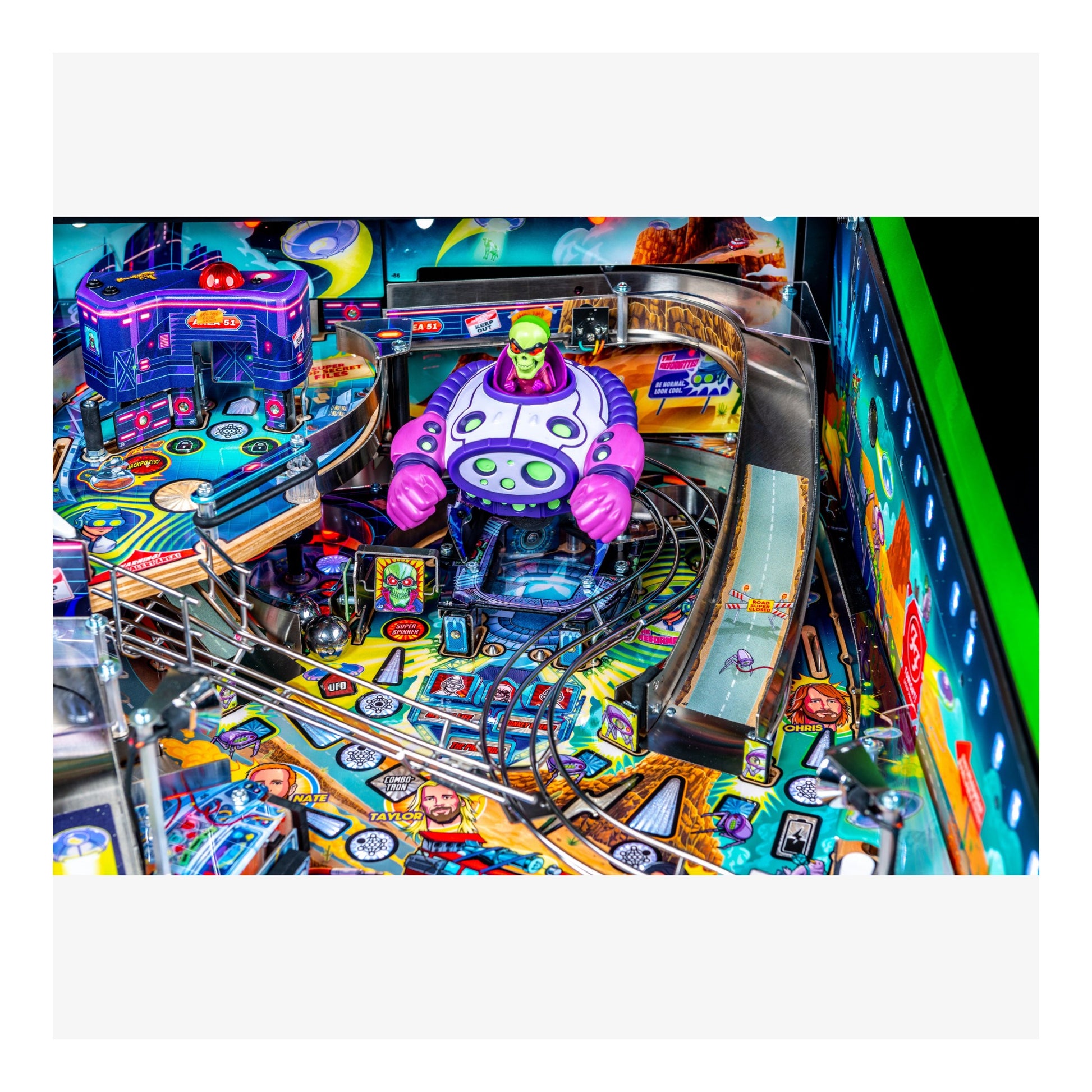 Colorful pinball machine with vibrant graphics and bright lights