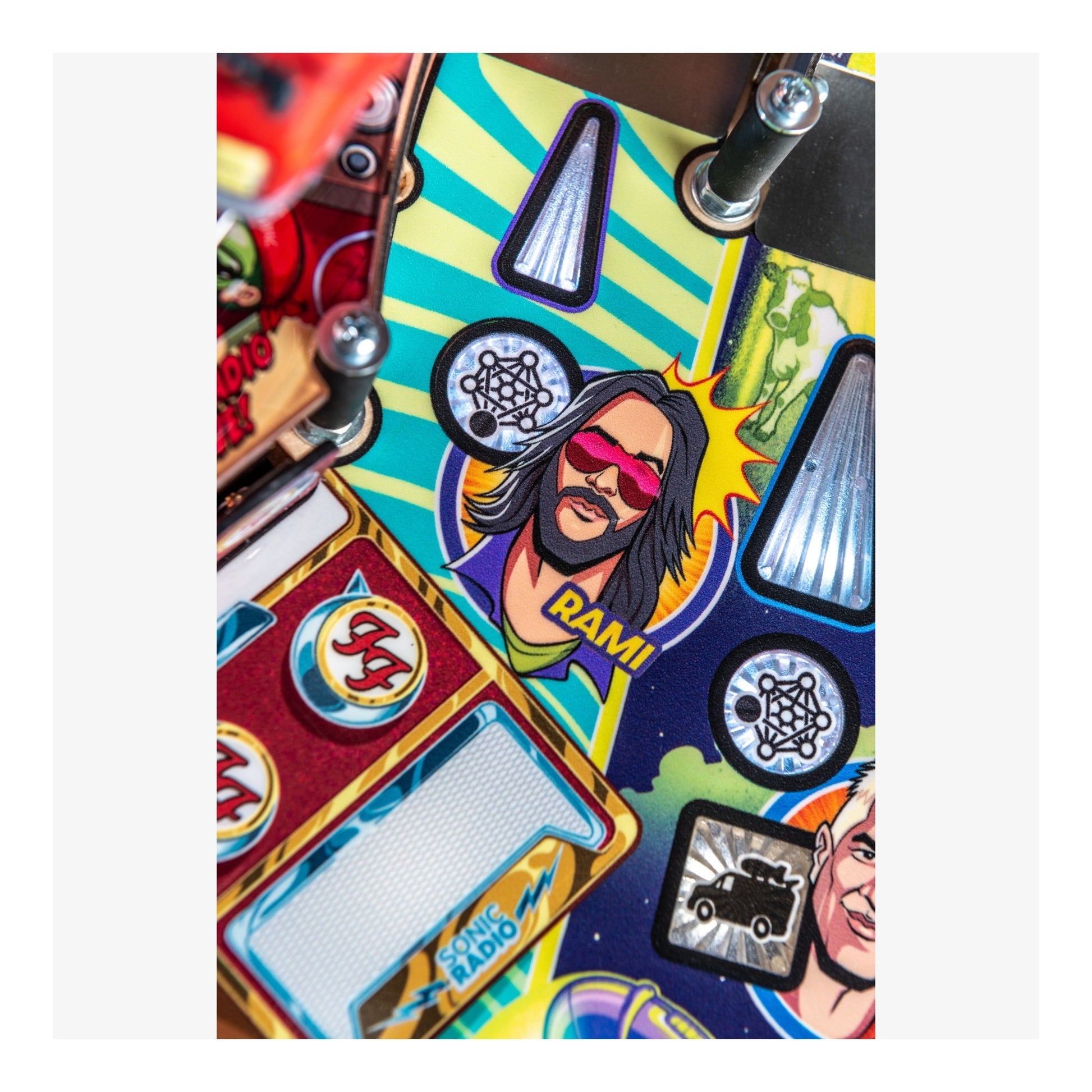 Colorful pinball machine with character illustration and 'Rami' branding