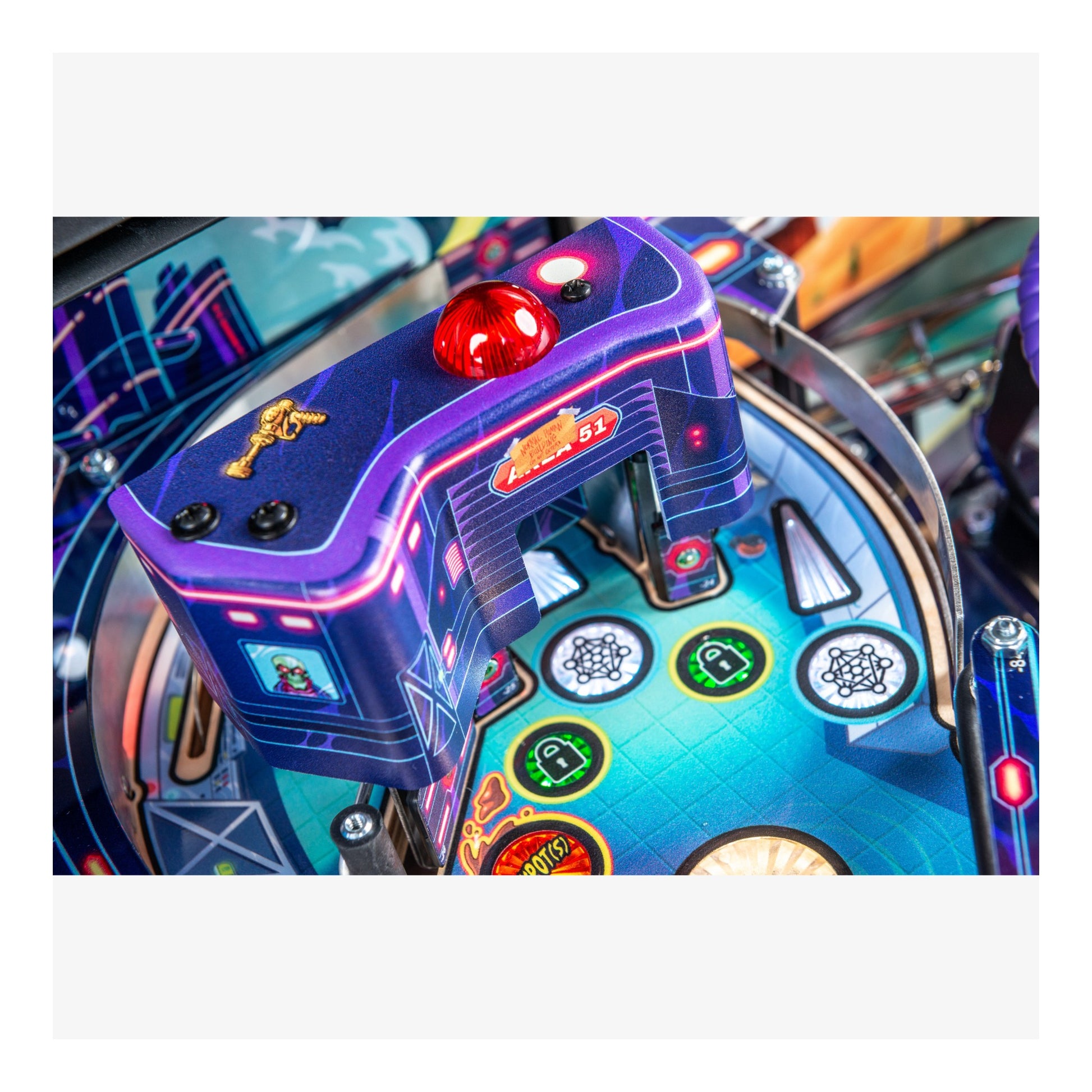 Close-up of a colorful pinball machine with vibrant lights and details.