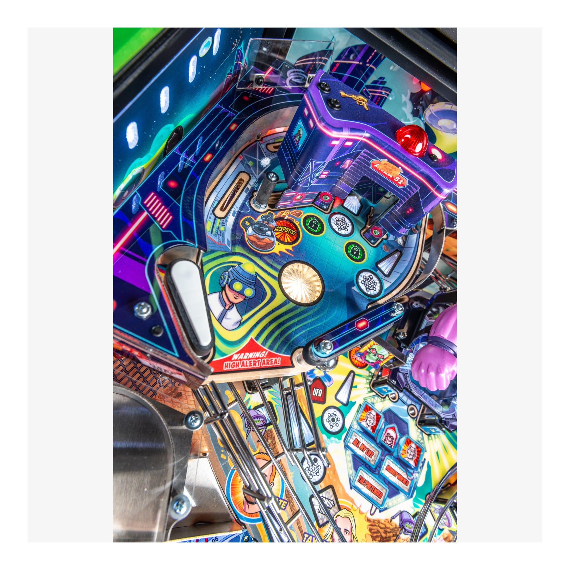Colorful pinball machine with detailed artwork and neon lights