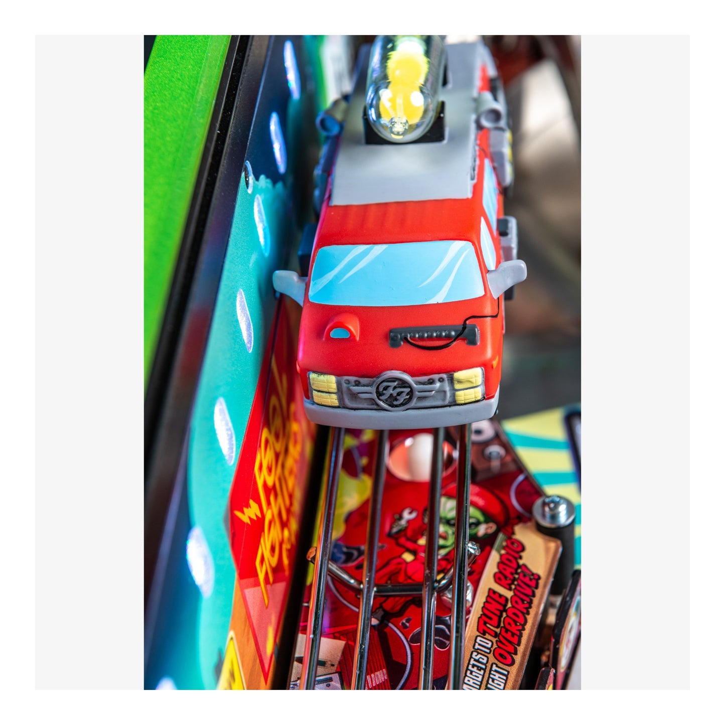 Toy car on a colorful pinball machine