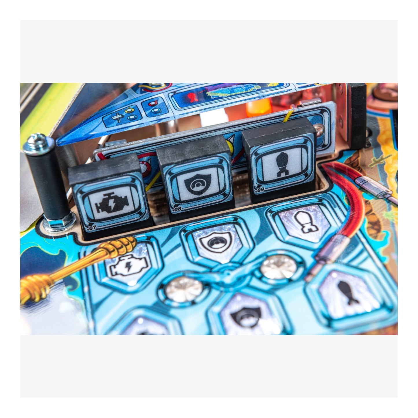 Close-up of a pinball machine with control panel and playfield