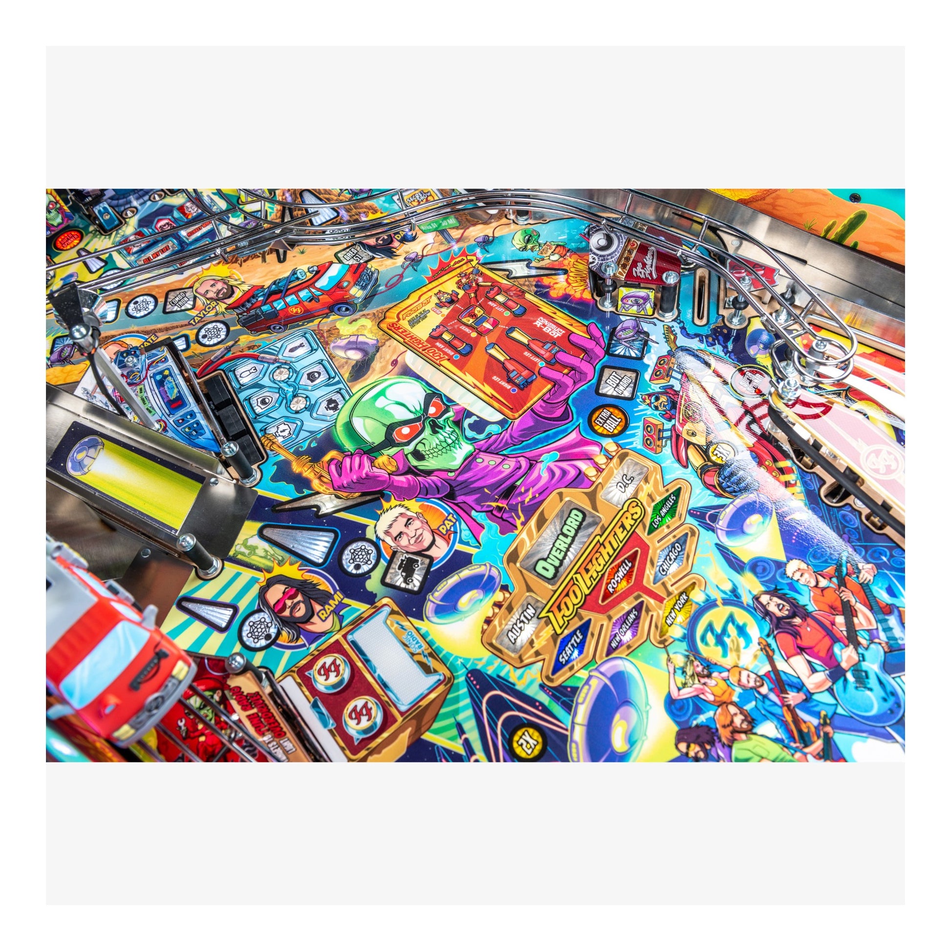 Colorful pinball machine with various symbols and designs on a white background