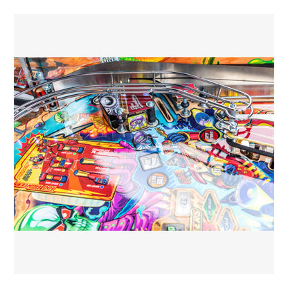 Colorful pinball machine with various components and artwork on a white background
