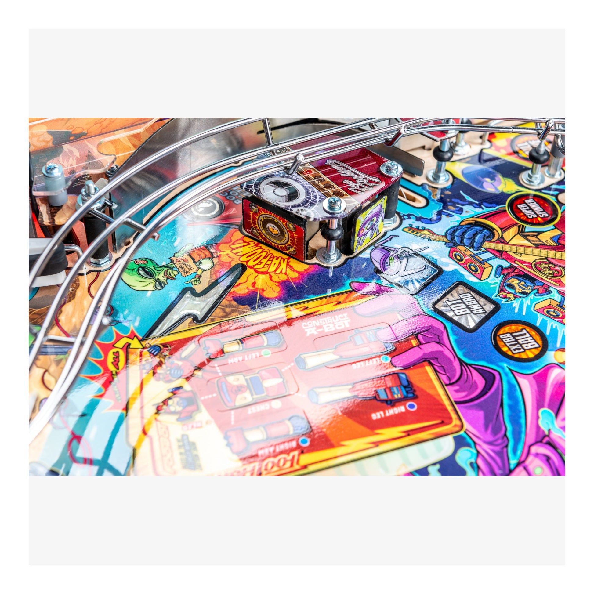 Close-up of a colorful pinball machine with detailed artwork