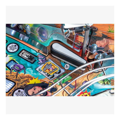 Close-up of a colorful pinball machine with various elements and graphics.