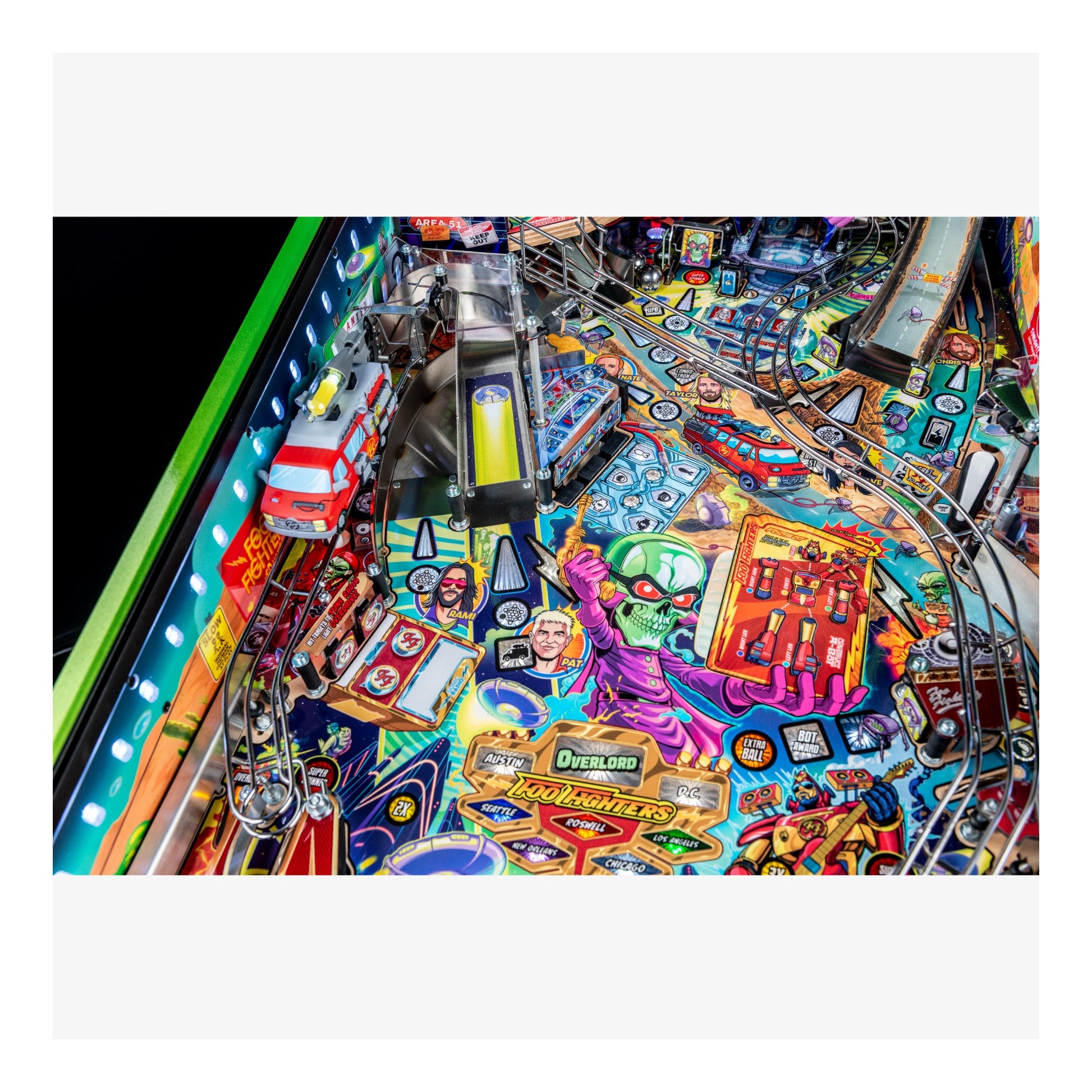 Colorful pinball machine with various symbols and designs on a white background