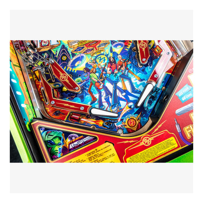Close-up of a colorful pinball machine with vibrant graphics and characters.