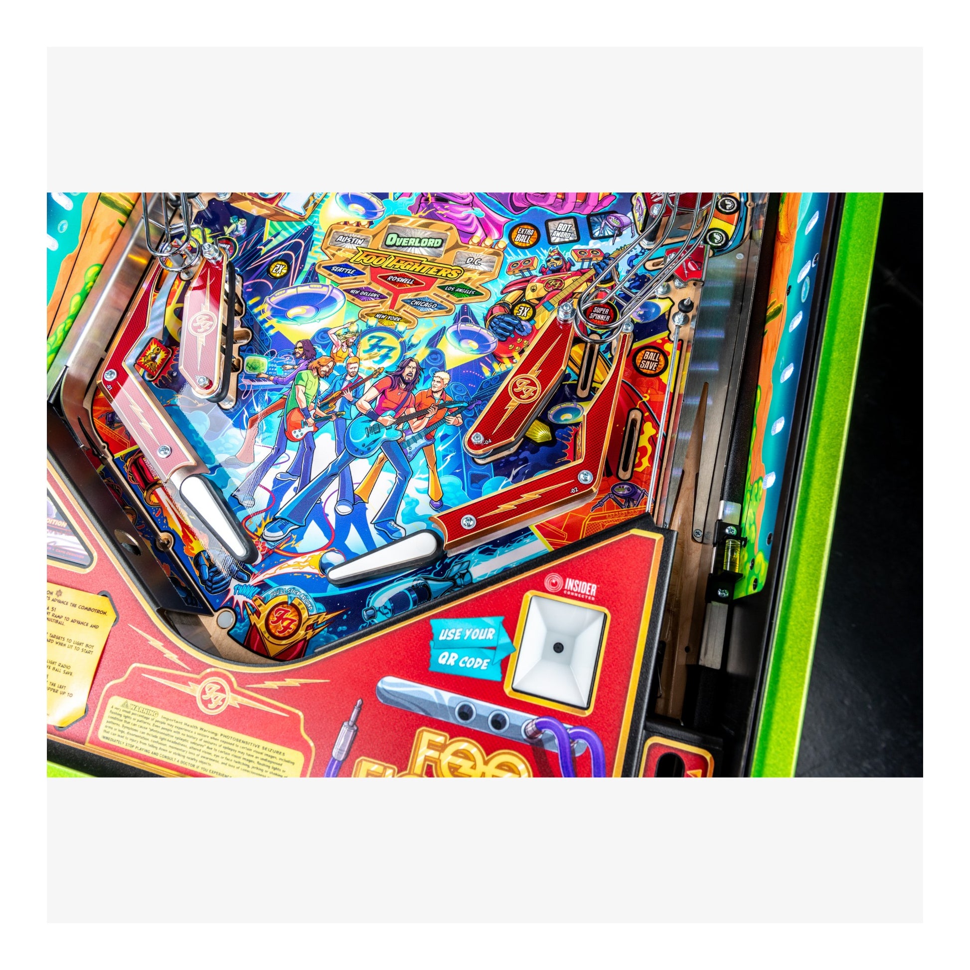 Colorful pinball machine with detailed artwork and vibrant colors.
