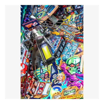 Close-up of a colorful pinball machine with various characters and graphics.