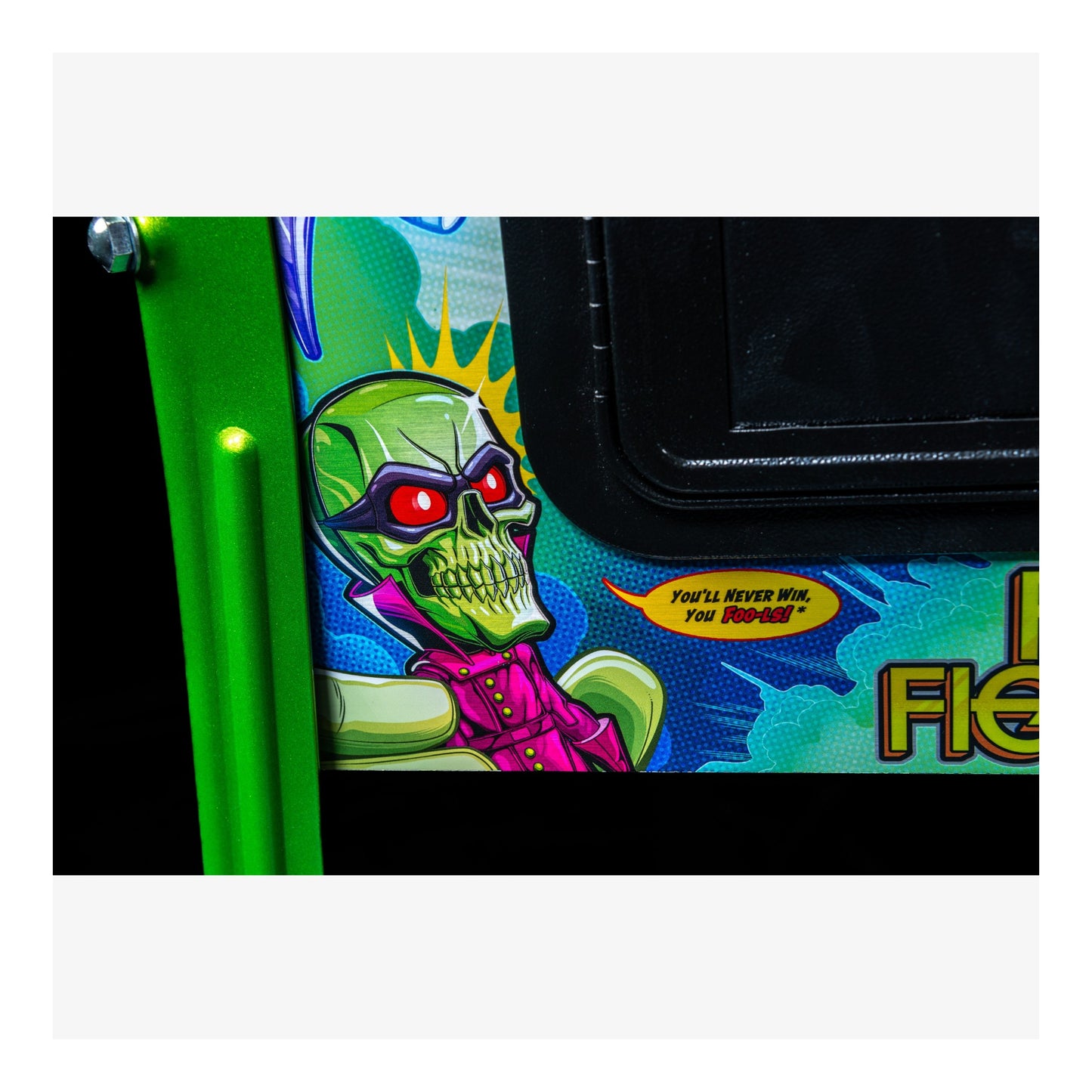 Colorful graphic with a green alien character on a product packaging.