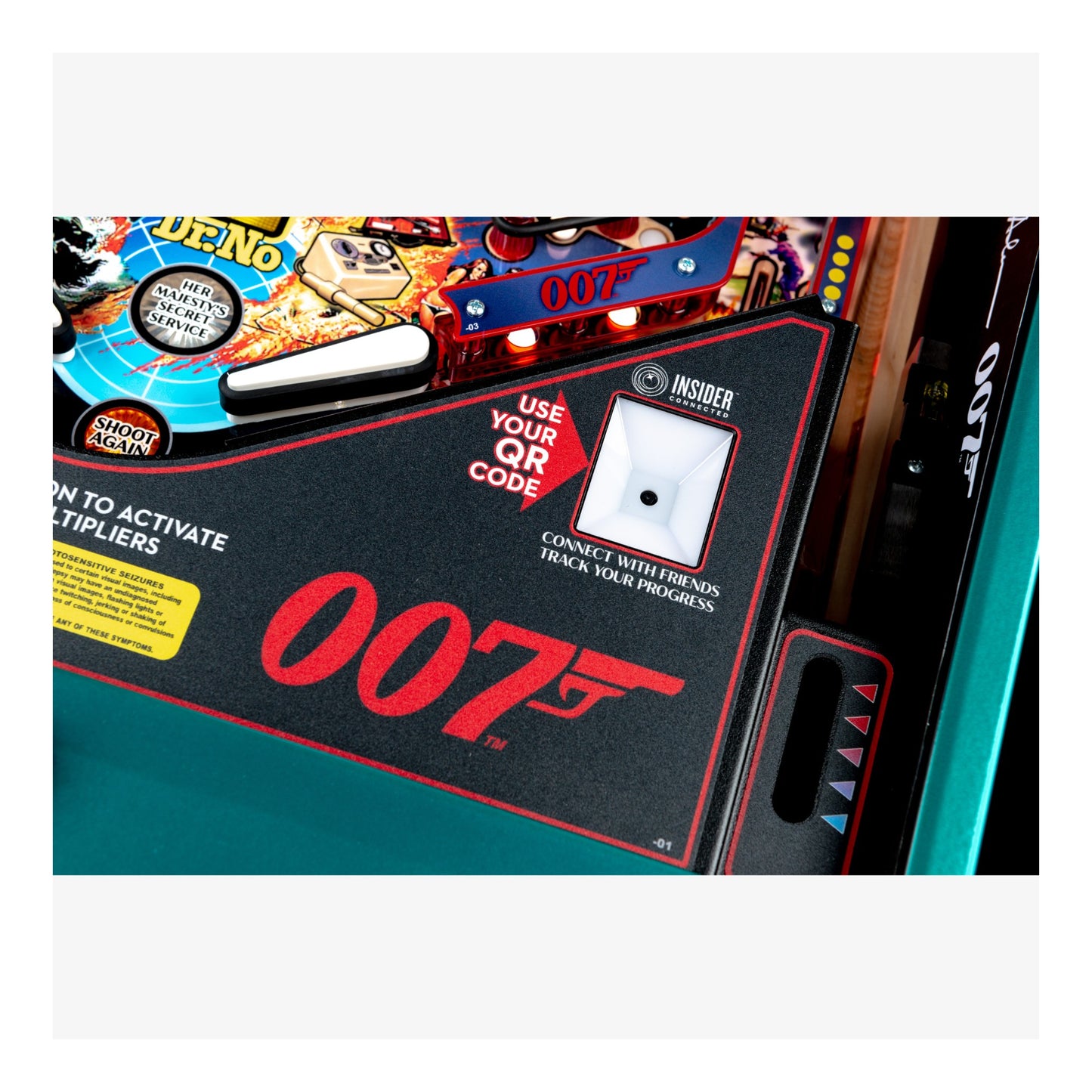 Pinball machine with '007' branding and colorful display