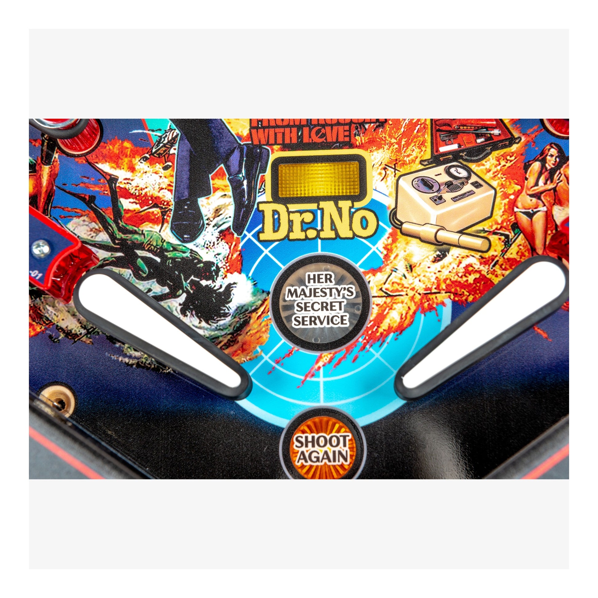 Close-up of a pinball machine with 'Dr. No' and 'Her Majesty's Secret Service' branding.