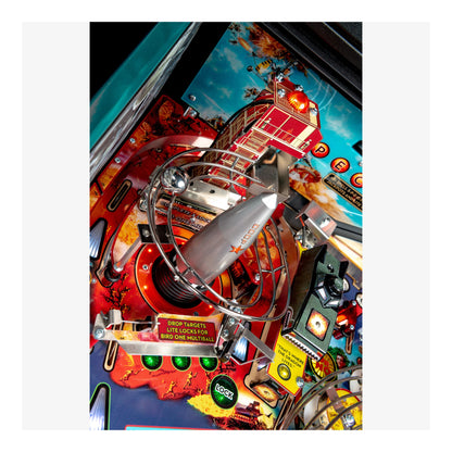 Close-up of a pinball machine with vibrant colors and detailed design.
