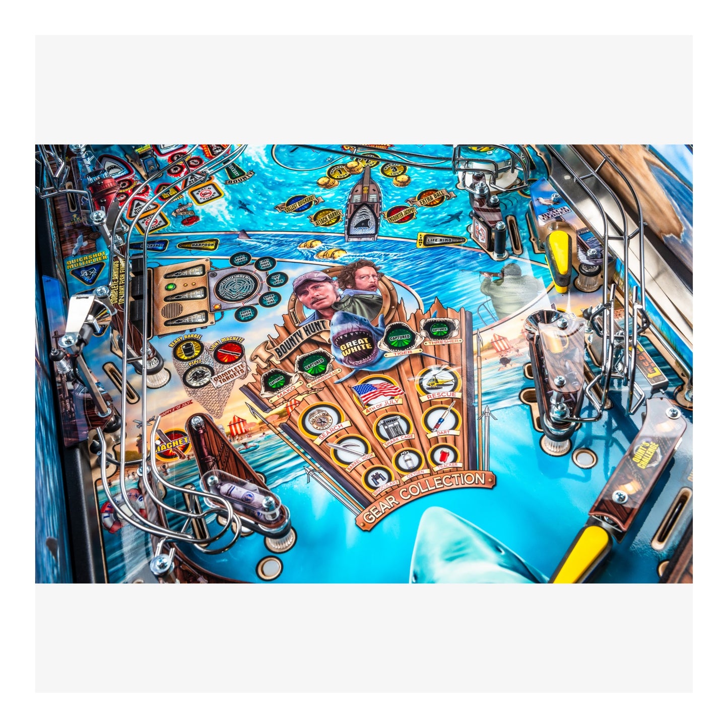 Close-up of a pinball machine with detailed artwork and components.