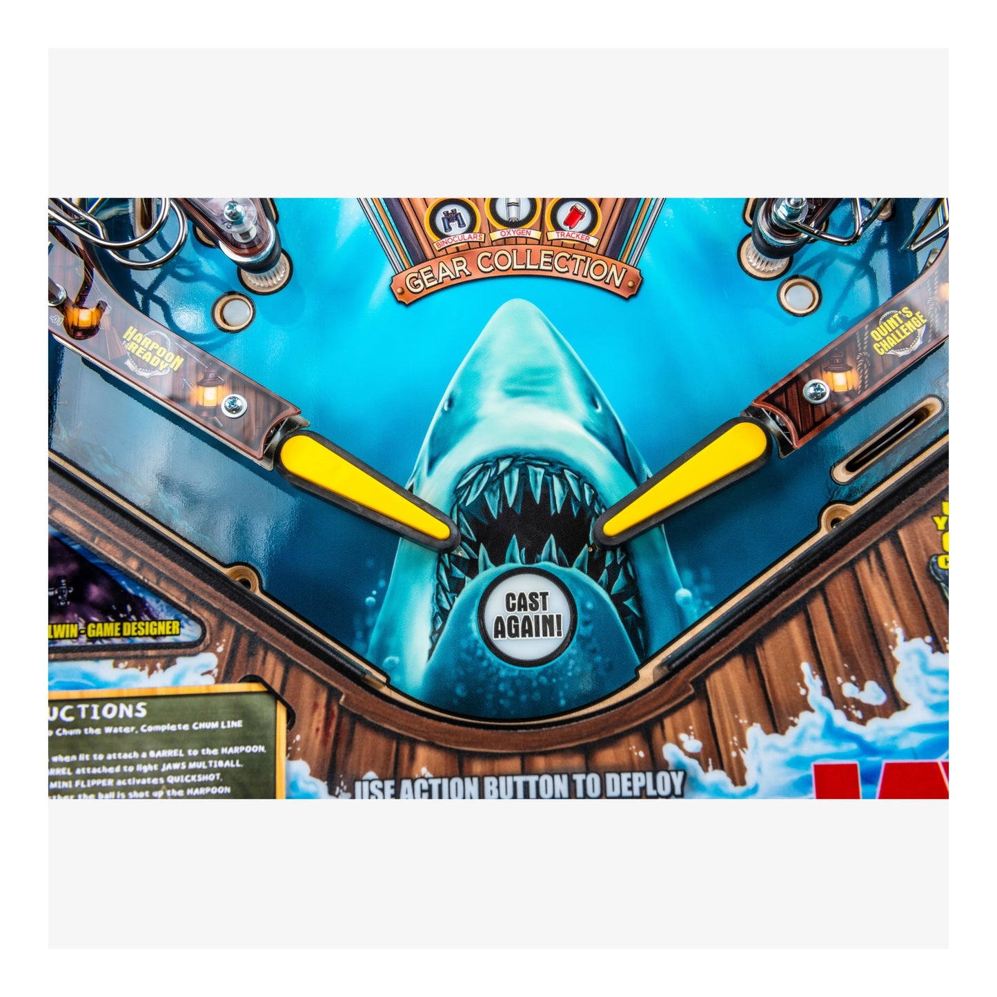 Close-up of a shark-themed product with a 'Cast Again!' button on a blue background.