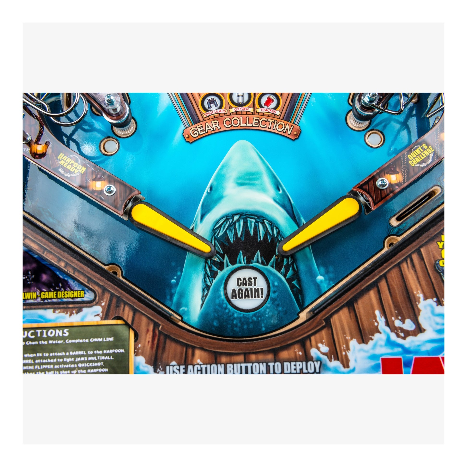 Close-up of a shark-themed product with a 'Cast Again!' button on a blue background.