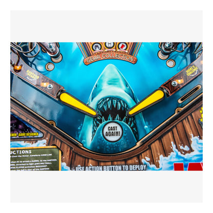 Close-up of a shark-themed product with a 'Cast Again!' button on a blue background.