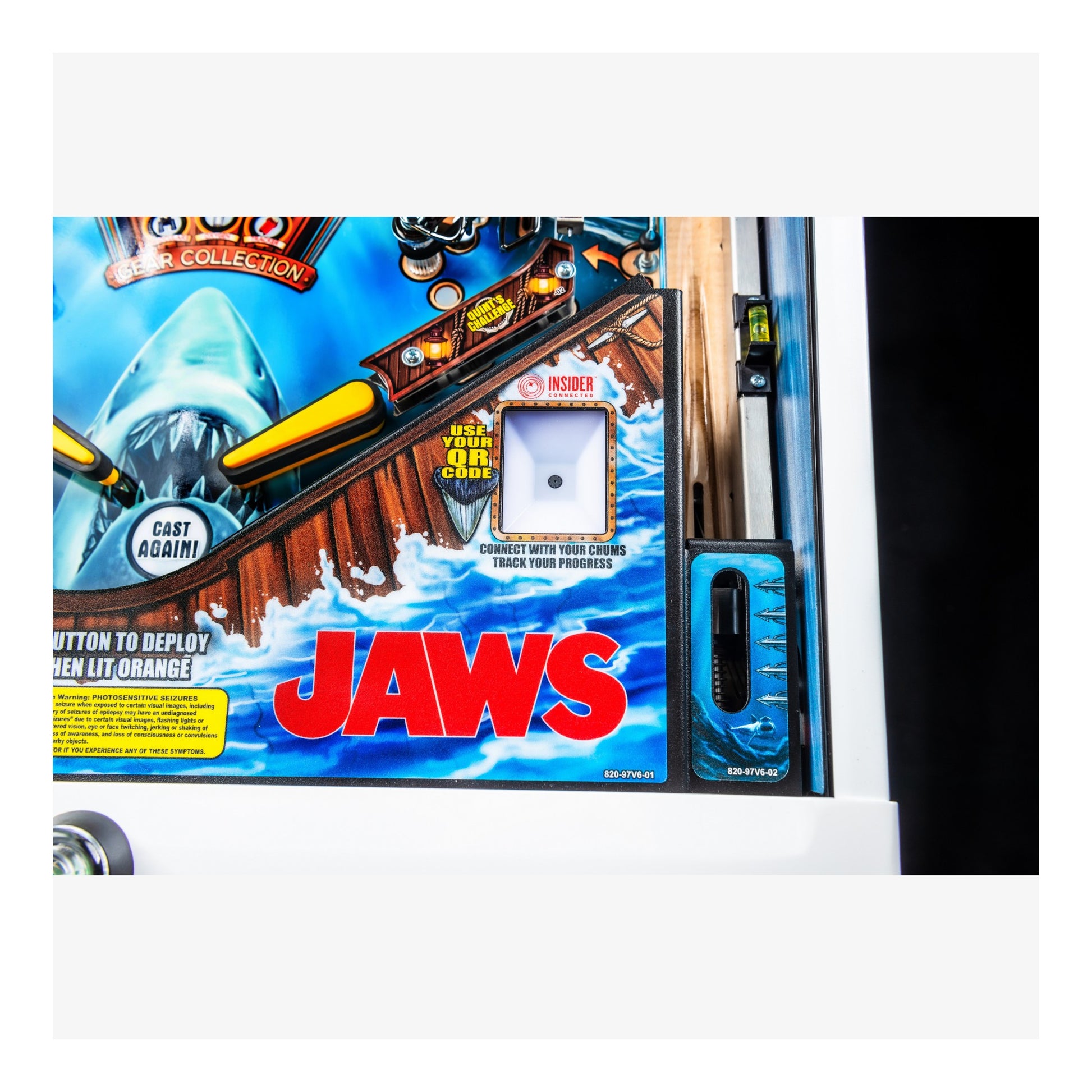 Pinball machine with 'Jaws' theme on a white background