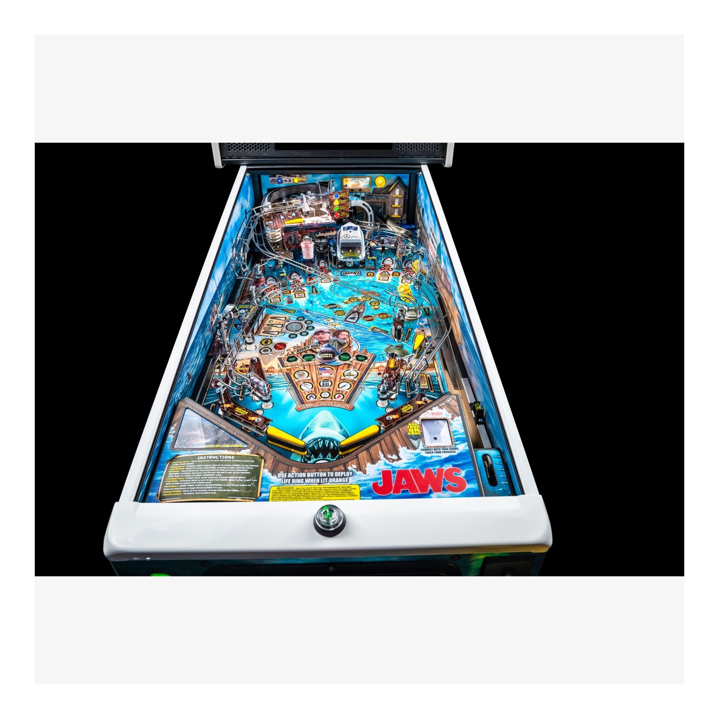 Pinball machine with 'Jaws' theme on a white background