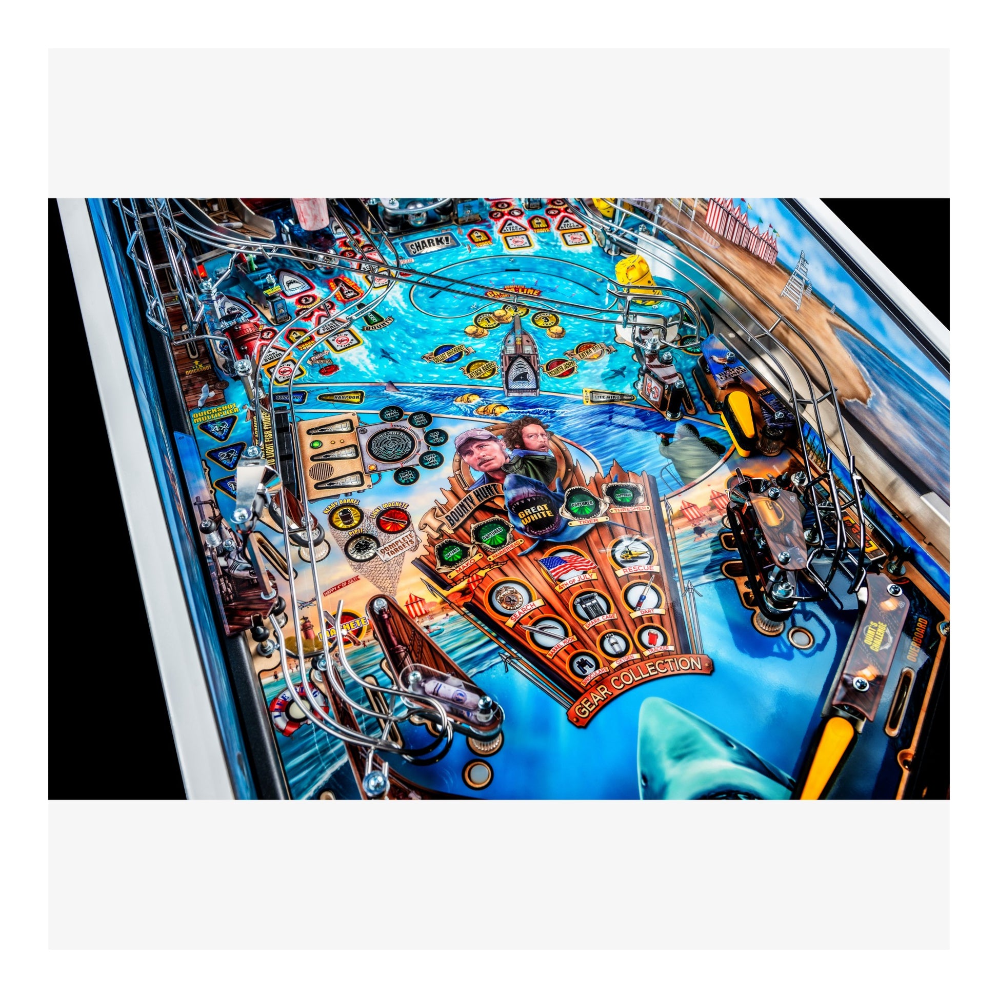 Close-up of a pinball machine with detailed artwork and components.