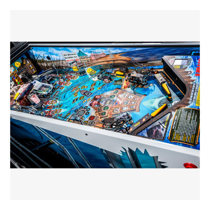 Close-up of a colorful pinball machine playing field