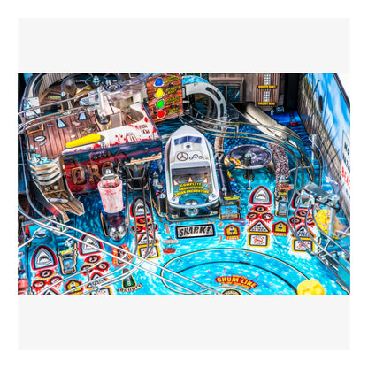 Pinball machine with colorful design and various symbols on a white background