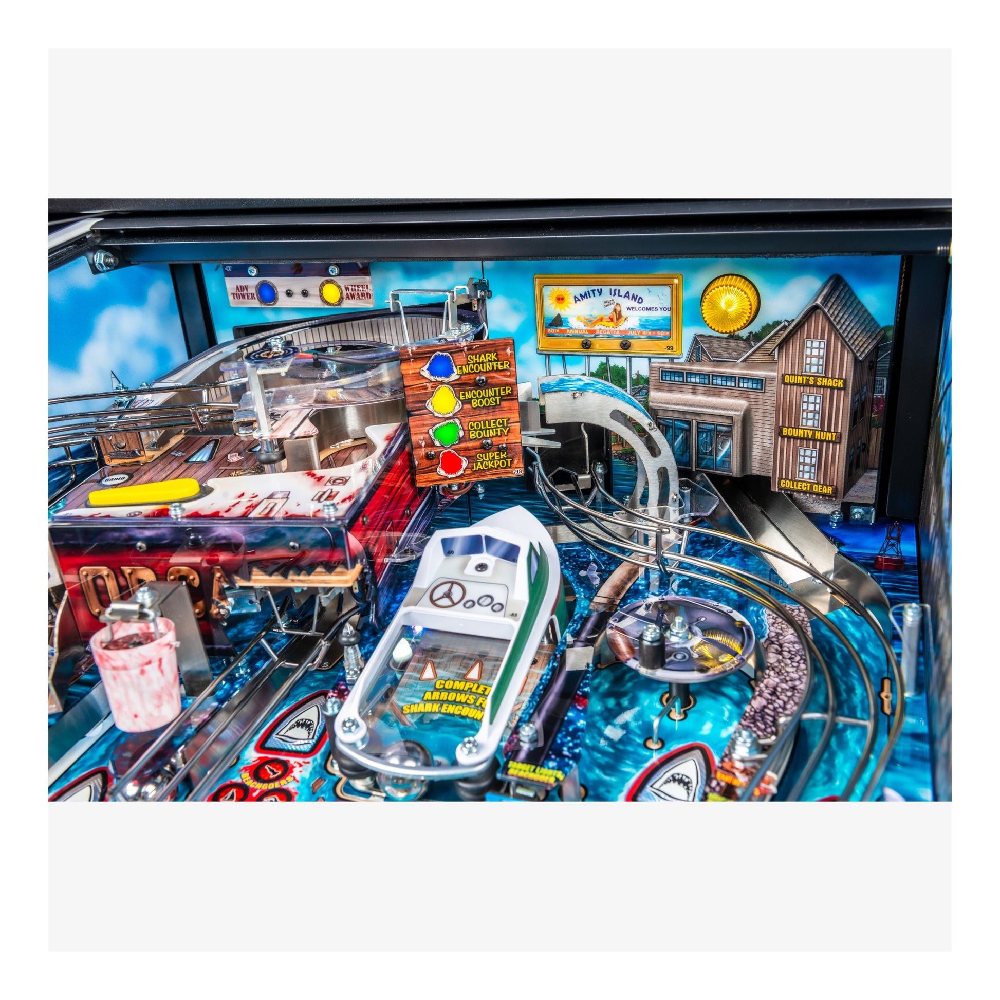 Close-up of a pinball machine with detailed artwork and playfield.