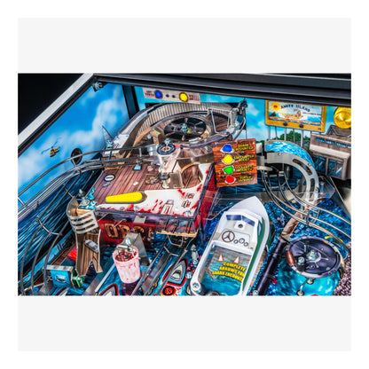 Close-up of a pinball machine with various components and a colorful background.