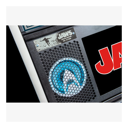 Close-up of a product with 'JAWS' branding and shark design.