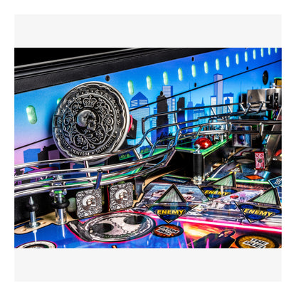 Close-up of a pinball machine with colorful design and lights.