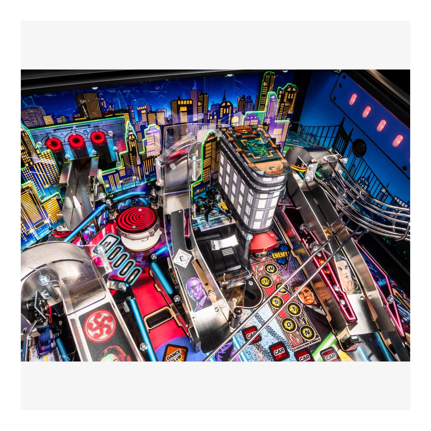 Colorful pinball machine with vibrant cityscape background