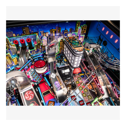 Colorful pinball machine with vibrant cityscape background
