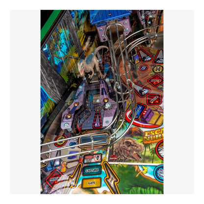 Close-up of a pinball machine with colorful design and various elements.