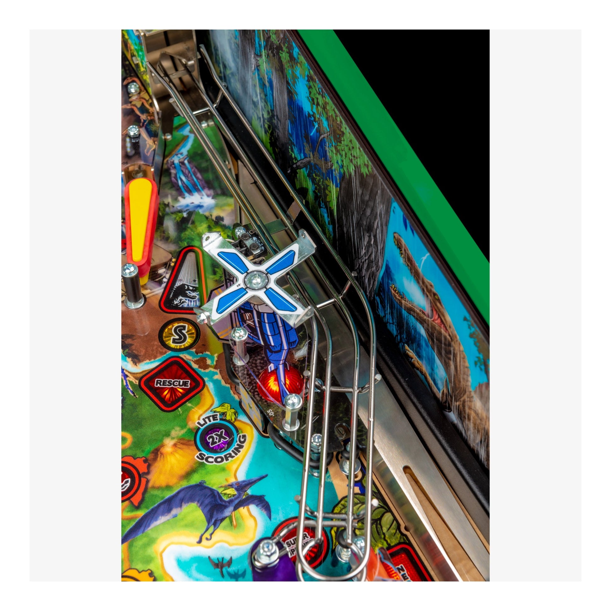 Close-up of a pinball machine with colorful artwork and a detailed playfield.