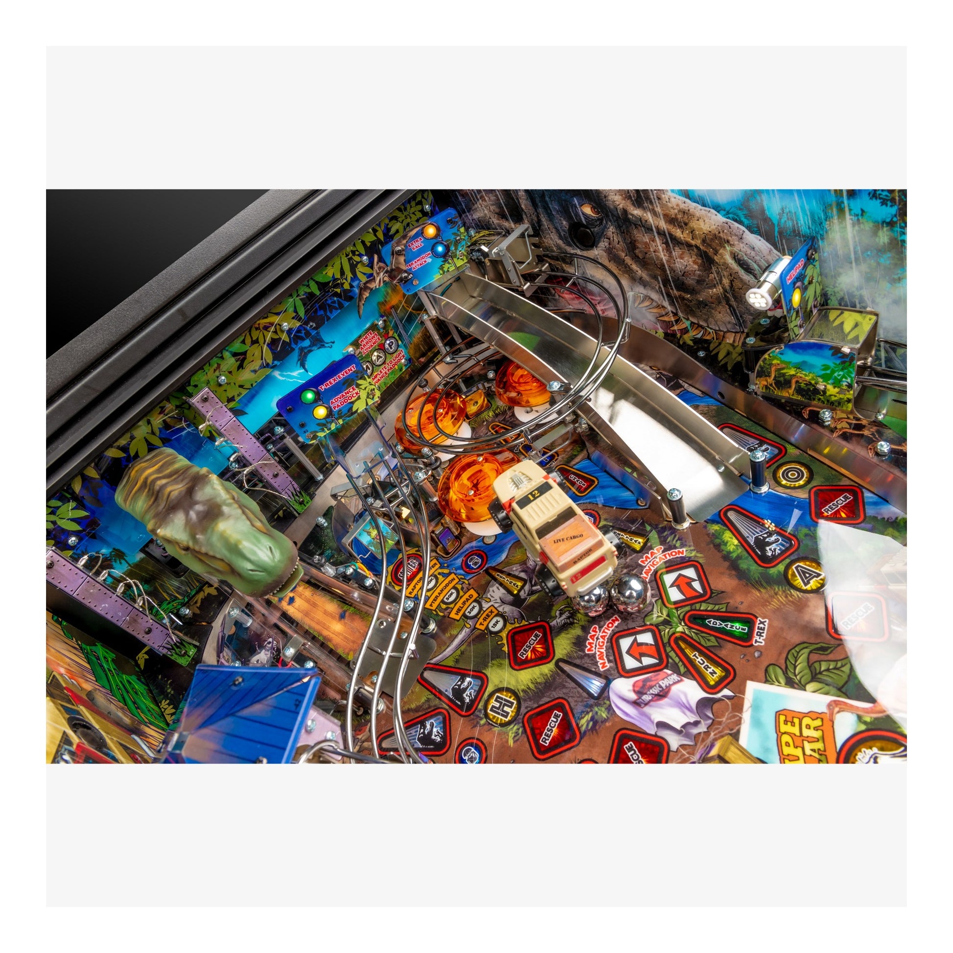 Close-up of a colorful pinball machine with various elements and a white border.