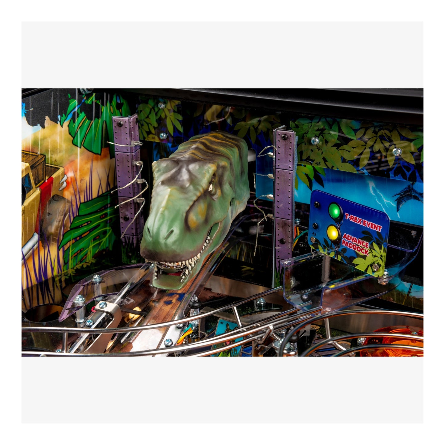 Pinball machine with dinosaur head and jungle-themed background