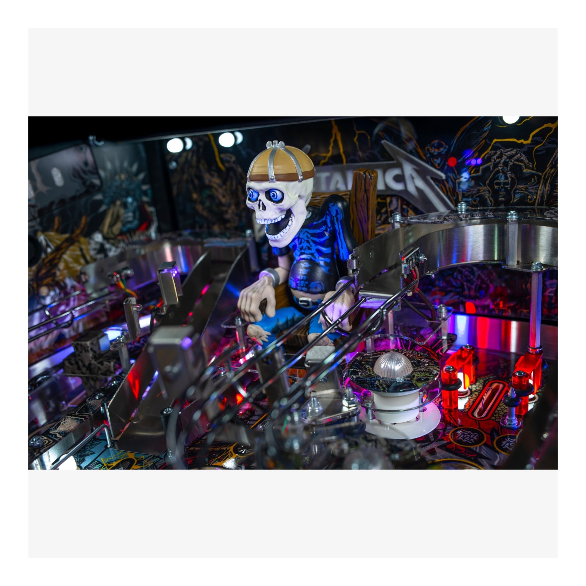 Pinball machine with a skeleton figure in a darkly decorated room