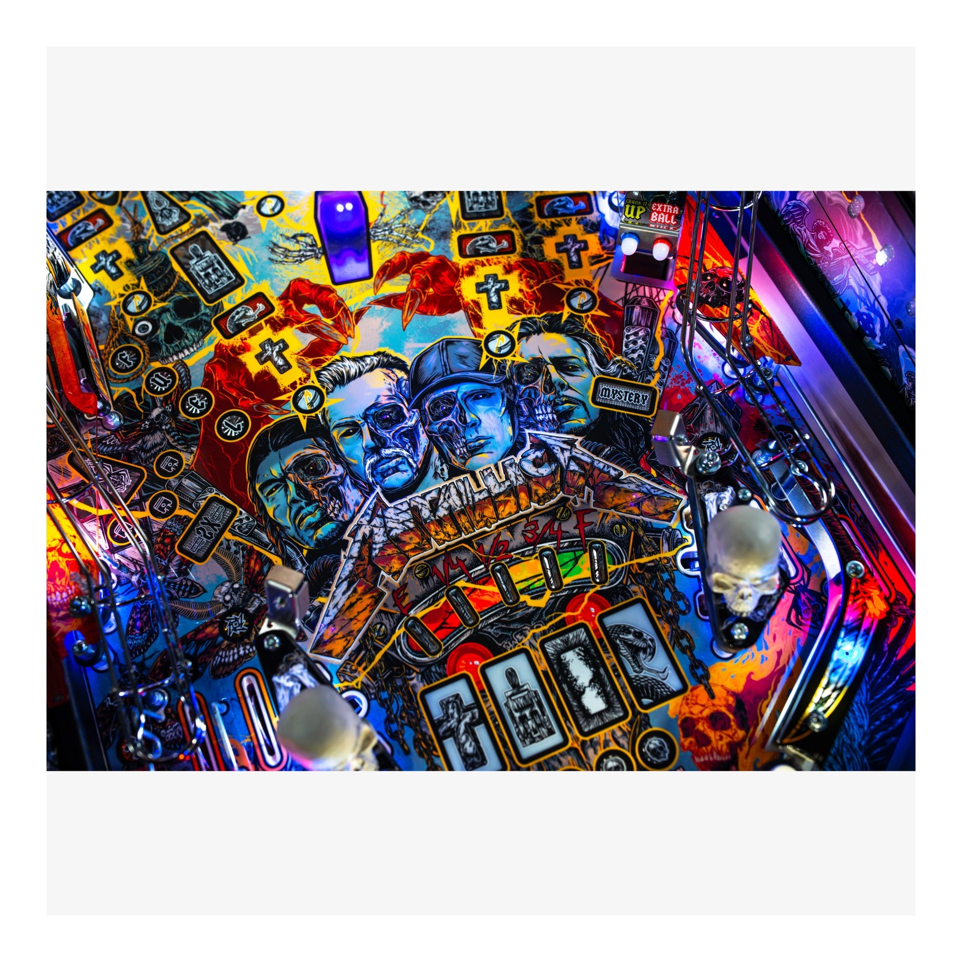 Colorful pinball machine with intricate designs and bright lights