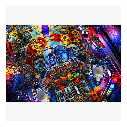 Colorful pinball machine with intricate designs and bright lights
