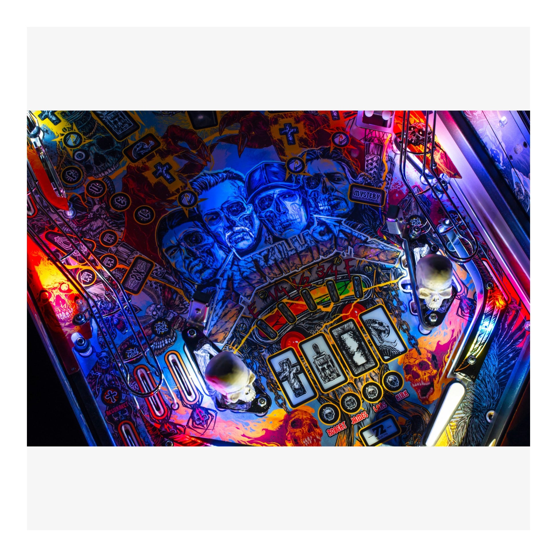 Colorful pinball machine with intricate details and glowing lights.