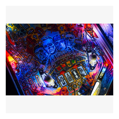 Colorful pinball machine with intricate details and glowing lights.