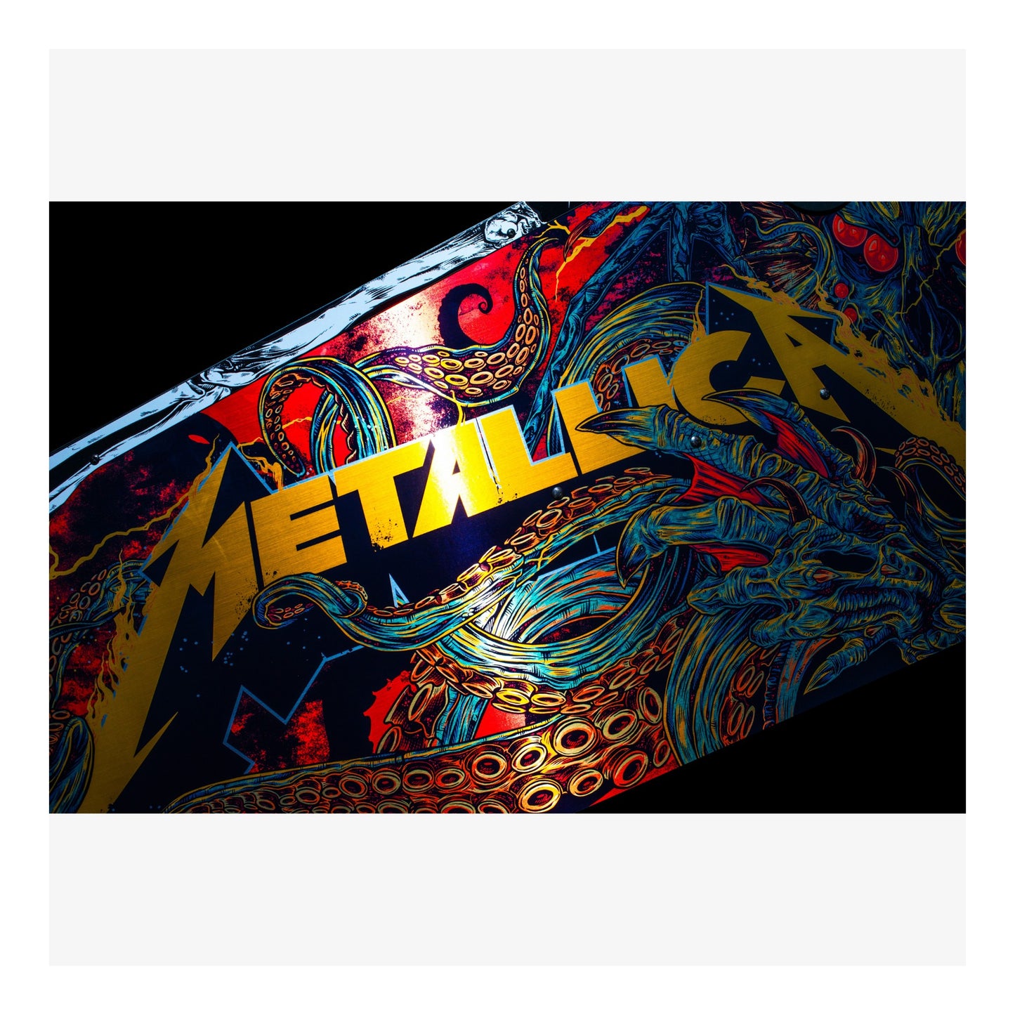 Colorful album cover with 'Metallica' branding and intricate designs.