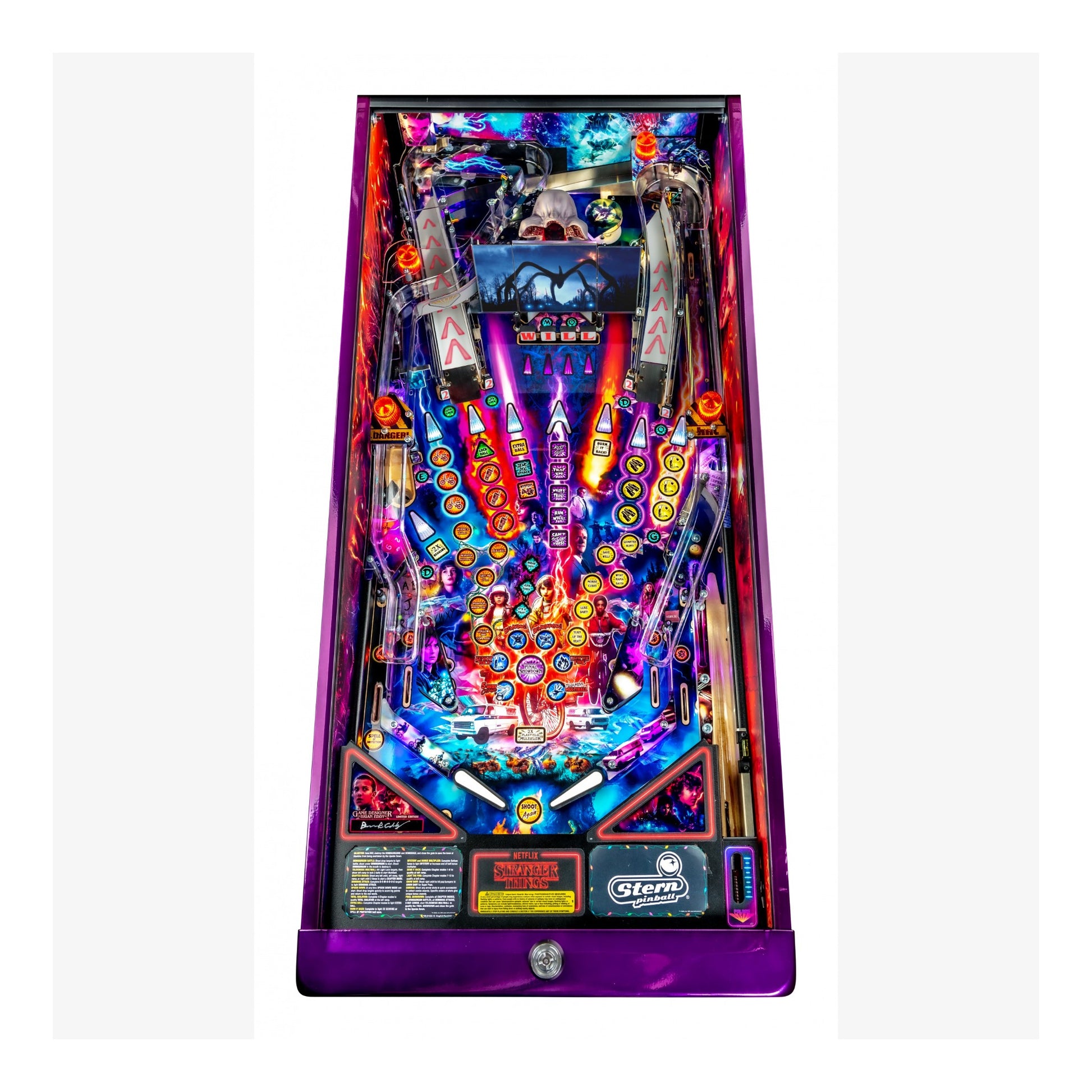 Colorful pinball machine with vibrant lights on a white background
