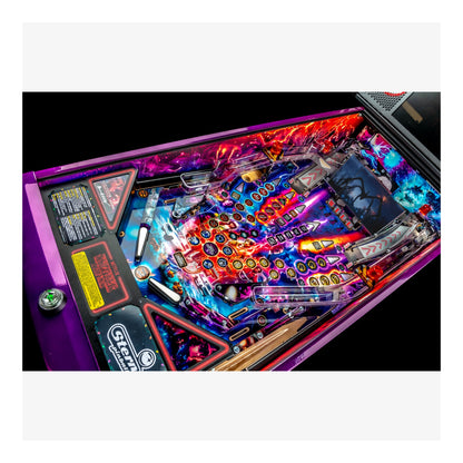 Close-up of a colorful pinball machine with vibrant lights and details.
