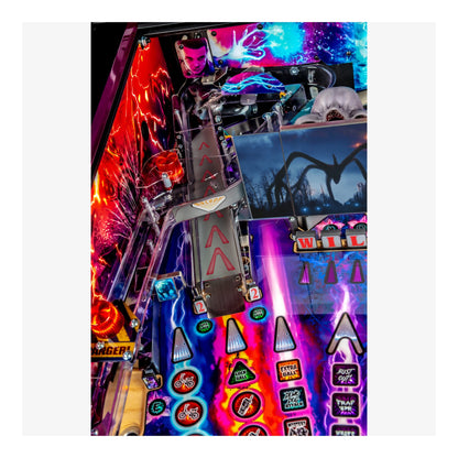 Close-up of a colorful pinball machine with various lights and symbols.