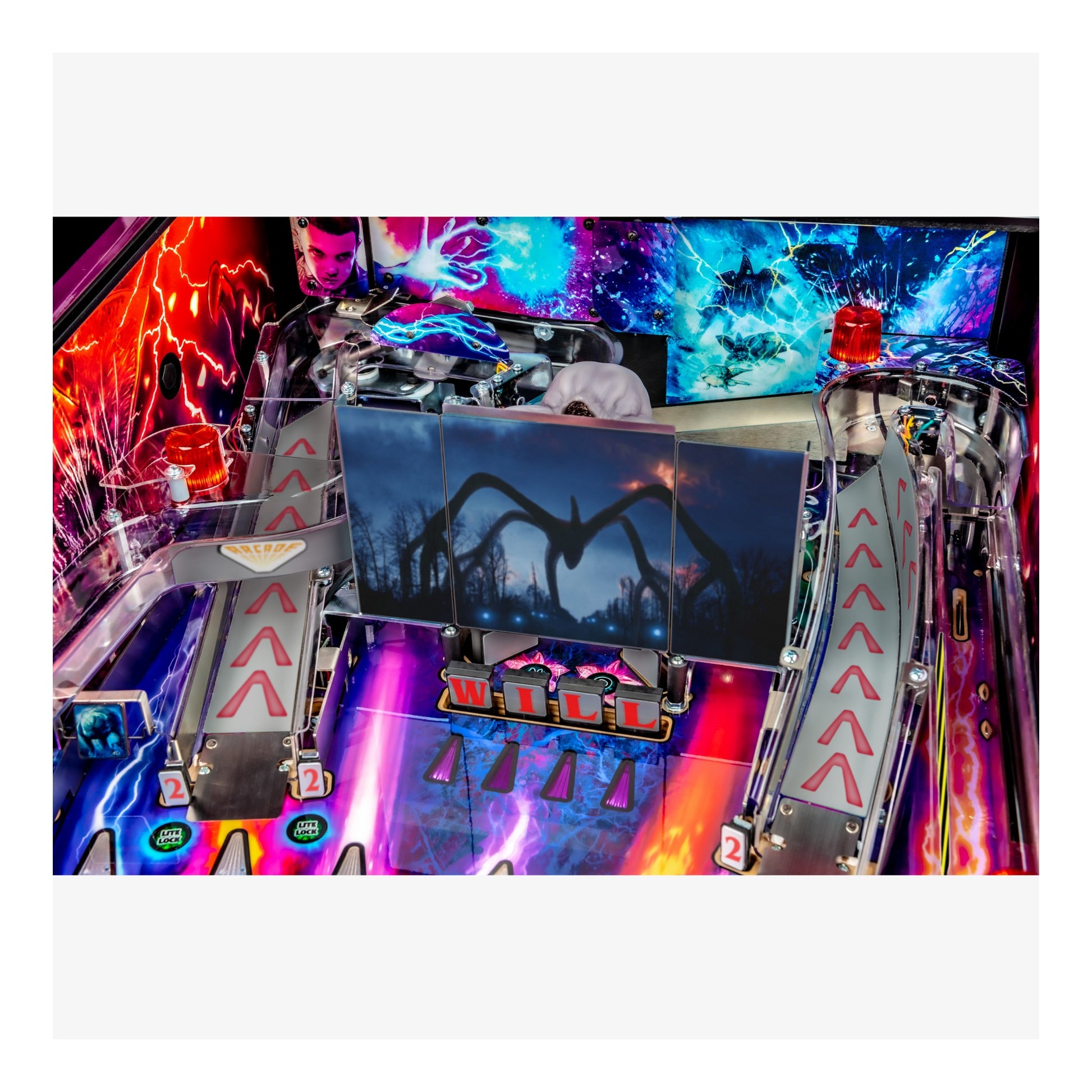 Colorful pinball machine with vibrant lights and detailed design