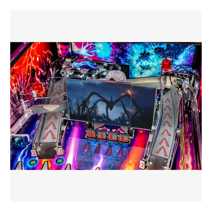 Colorful pinball machine with vibrant lights and detailed design