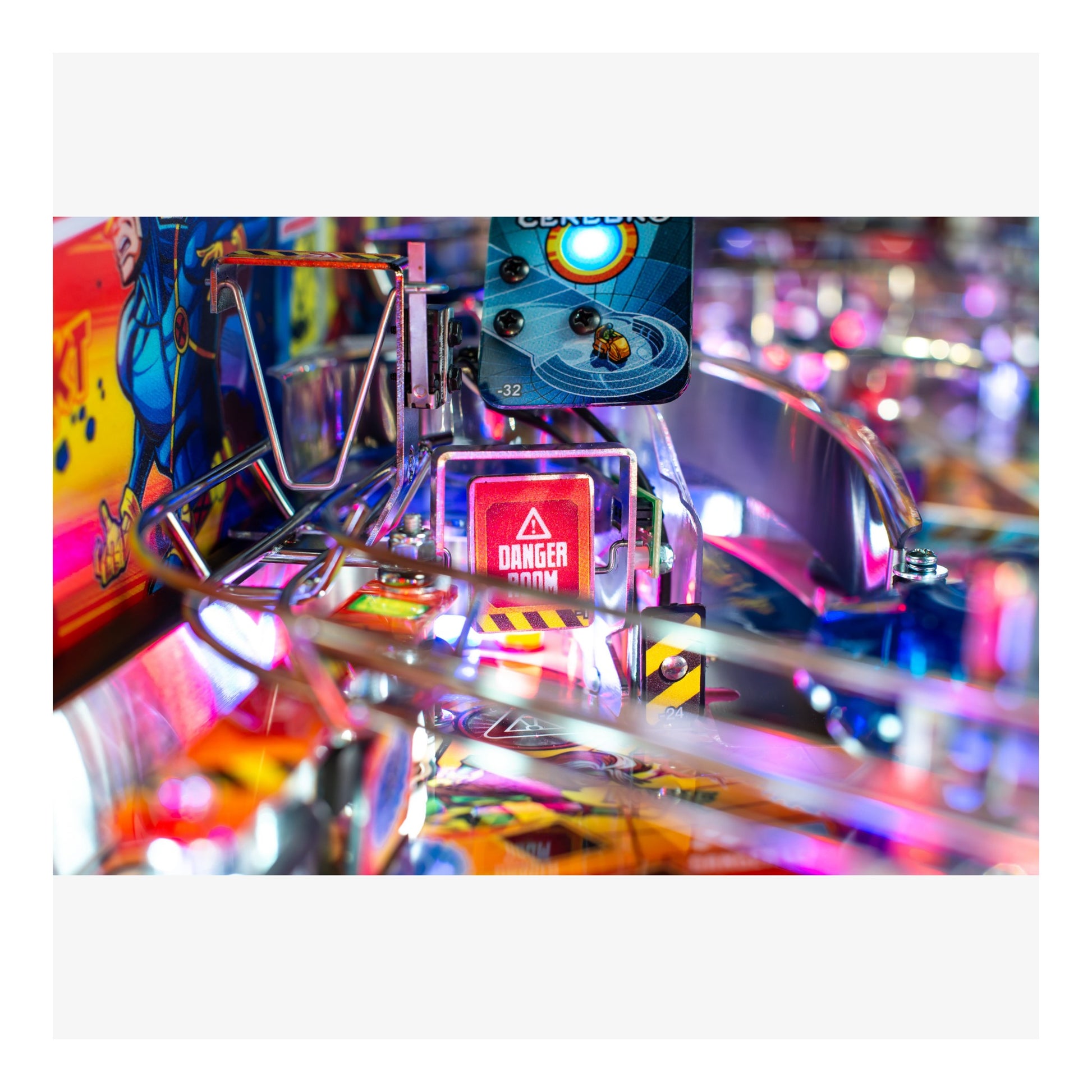 Close-up of a colorful pinball machine with vibrant lights and details.