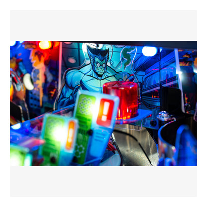 Close-up of a pinball machine with colorful lights and a character illustration.